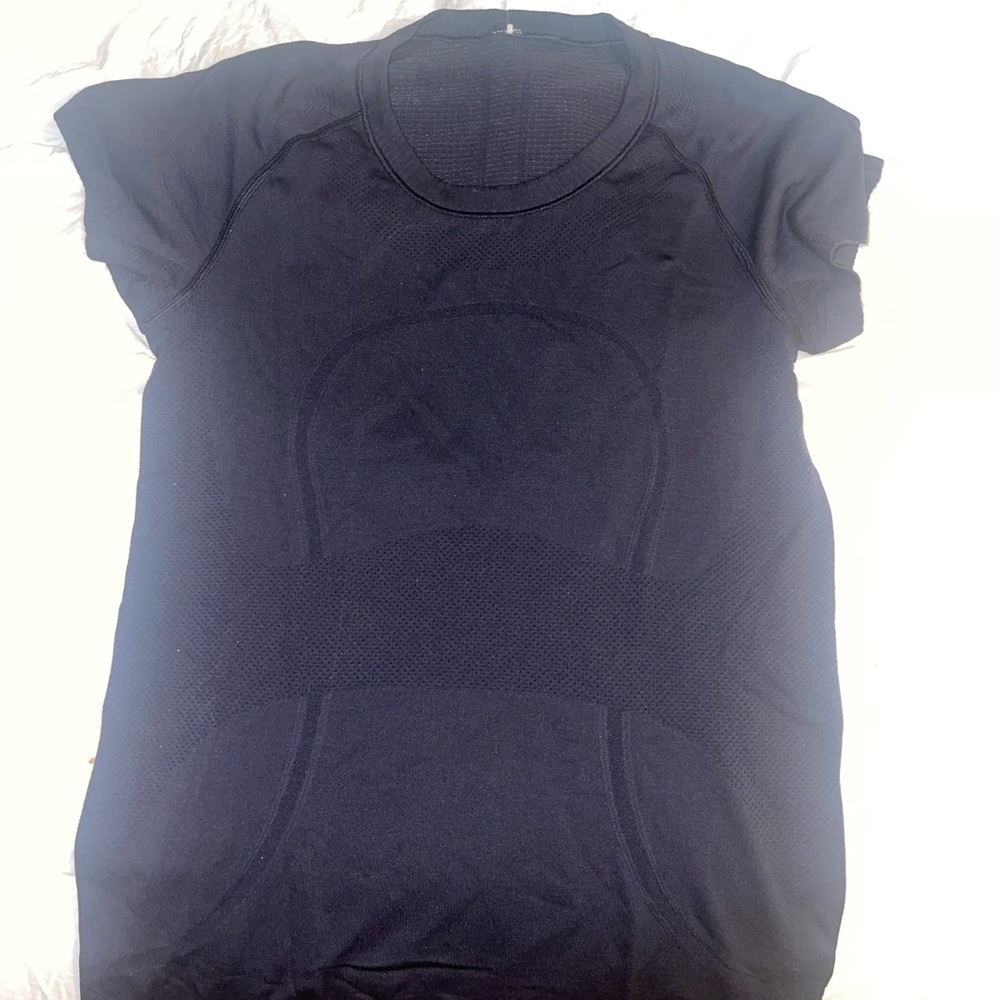 Navy blue lululemon short sleeve top.